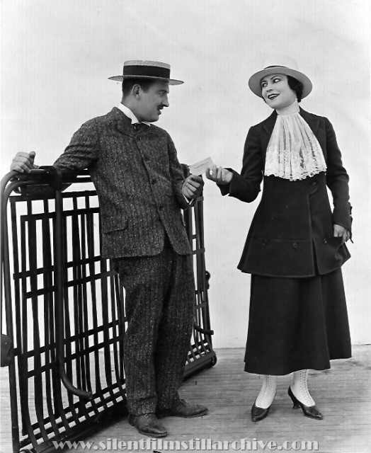 Raymond Griffith and Mary Thurman in A SCOUNDREL'S TOLL (1916)