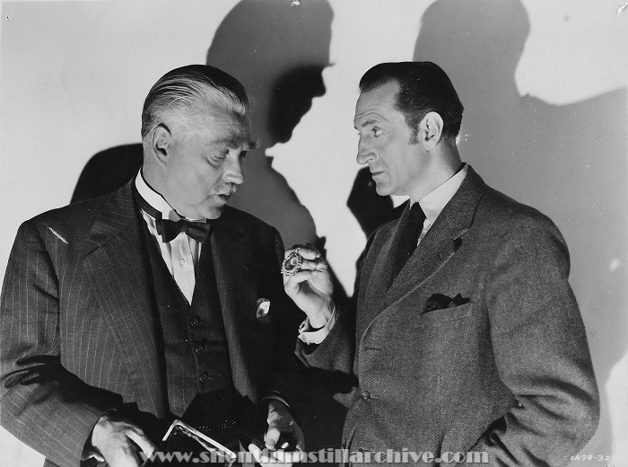 Nigel Bruce and Basil Rathbone in TERROR BY NIGHT (1946)