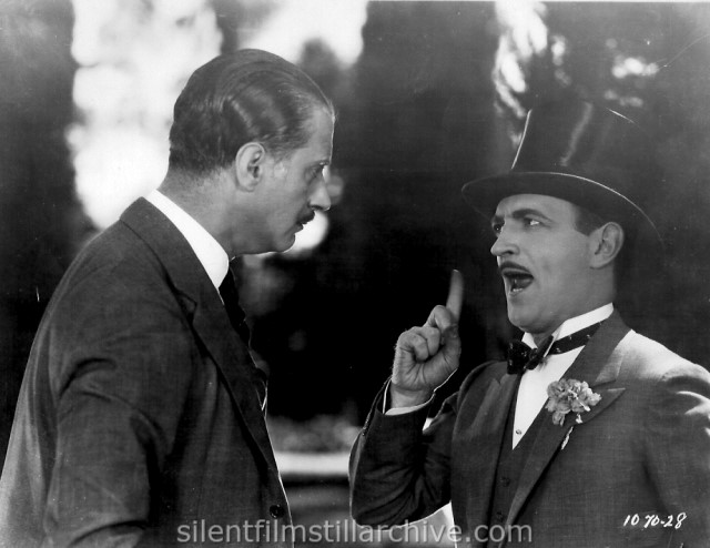 Pierre de Ramey and Raymond Griffith in TIME TO LOVE(1927)