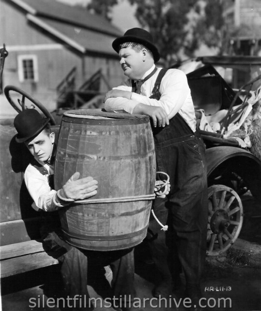 Stan Laurel and Oliver Hardy in TOWED IN A HOLE (1932)