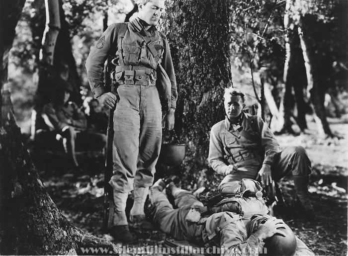 Dana Andrews, Lloyd Bridges, and Herbert Rudley in A WALK IN THE SUN (1945)