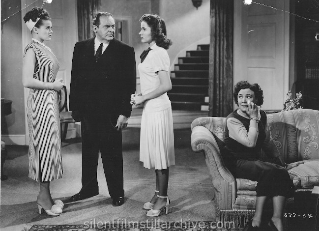 Edward Arnold, Joyce Reynolds and Janis Paige in WALLFLOWER (1948)