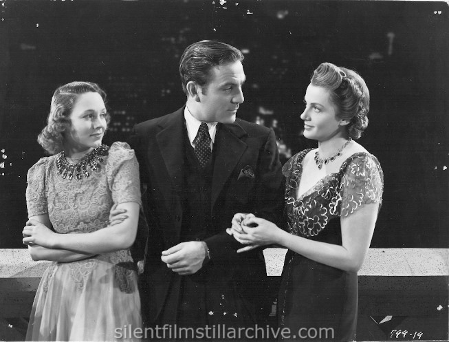 Claire Dodd, Henry Wilcoxon and Freida Inescourt in WOMAN DOCTOR (1939)