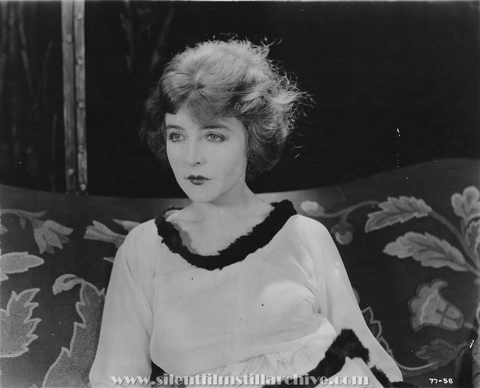 Enid Bennett in THE WOMAN IN THE SUITCASE (1920)