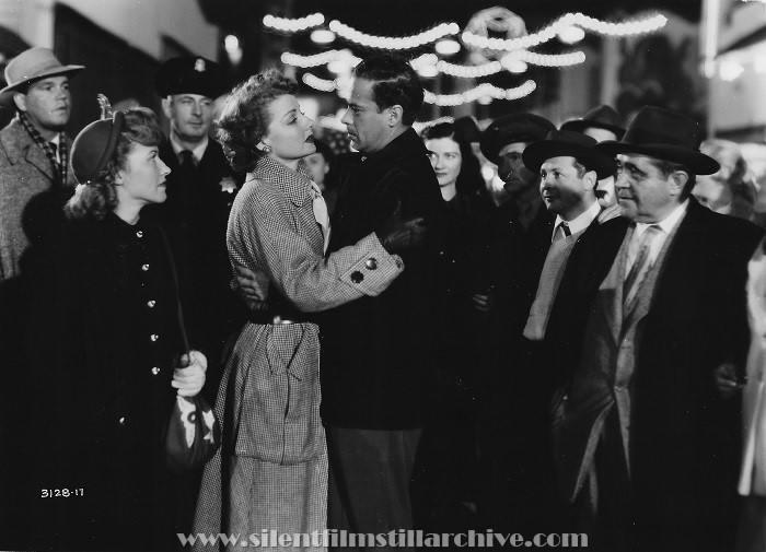 Ann Sheridan and Ross Elliott in WOMAN ON THE RUN (1950)